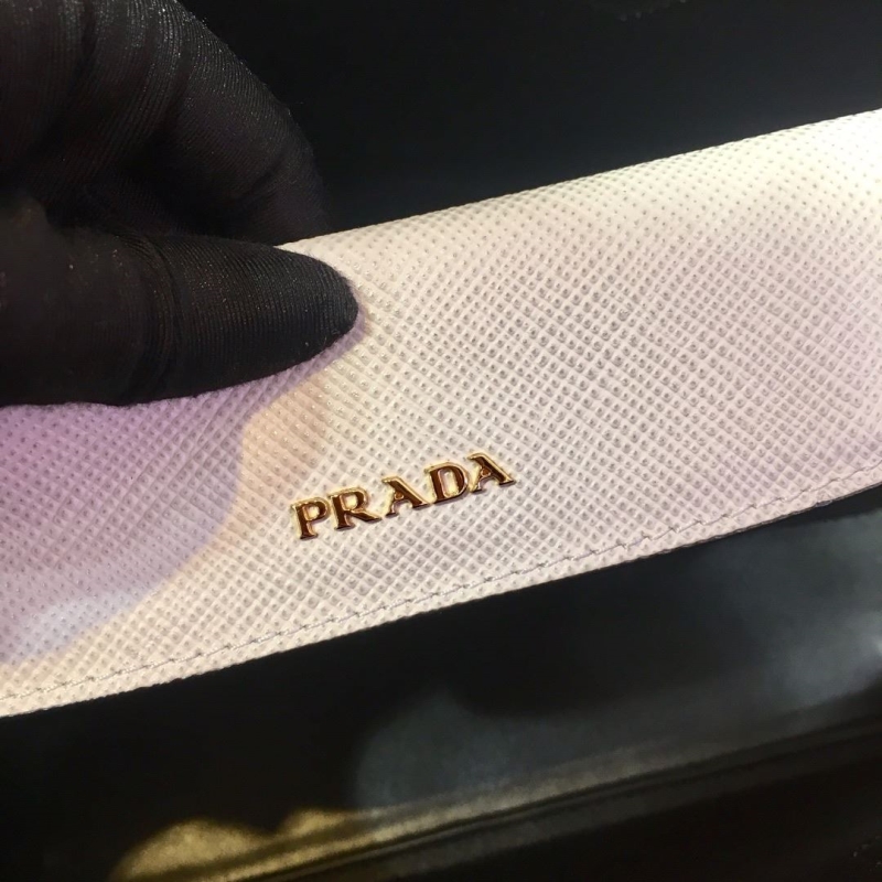 Pra*a top handle bags